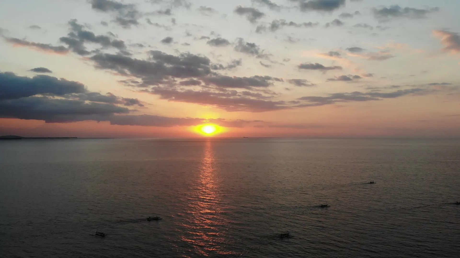 Drone photograph of a sunset over the ocean in Indonesia